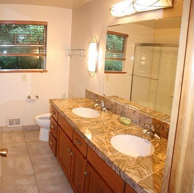 Granite counters in main bath.