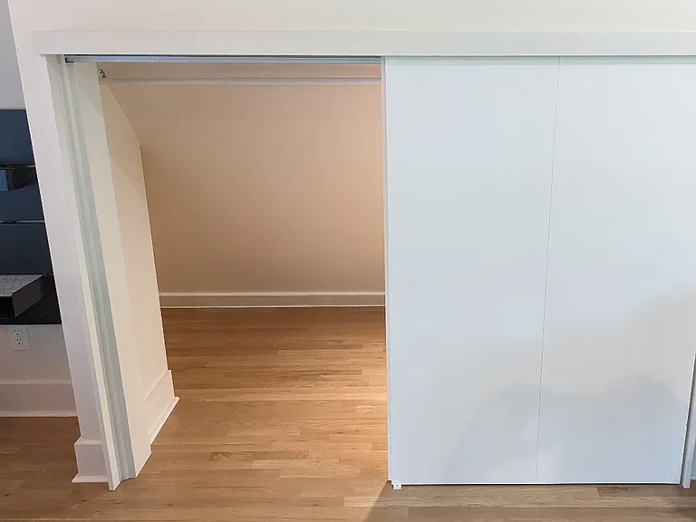 Hanging space with sliding door