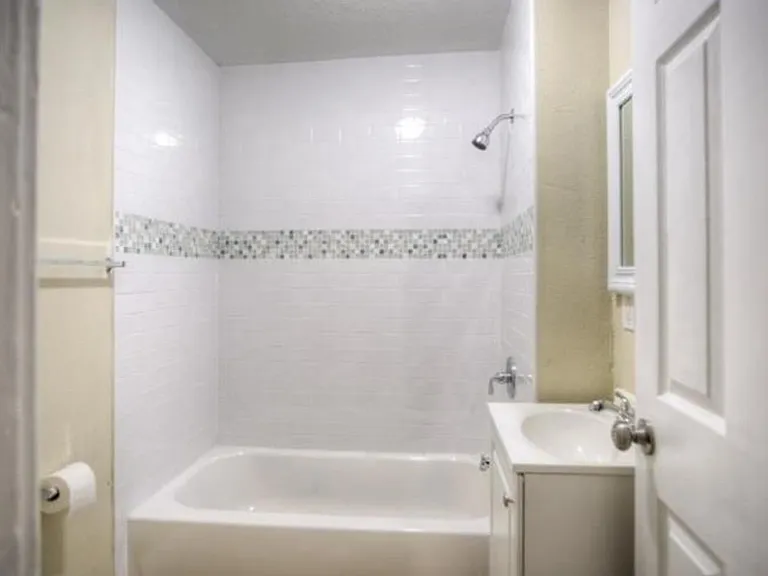 Second bathroom has tub and shower.