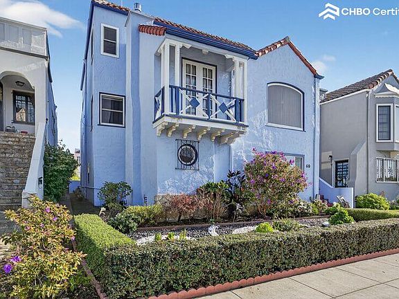 Living room balcony affords view of the street