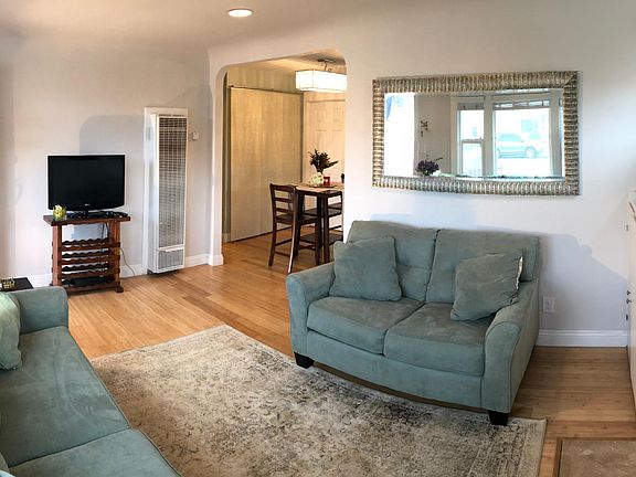 Open Concept - Living Flows into Dining Room and Kitchen