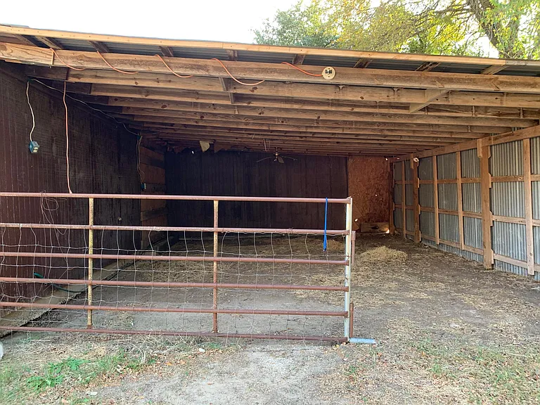 Gate opens. Can be used as a carport.
