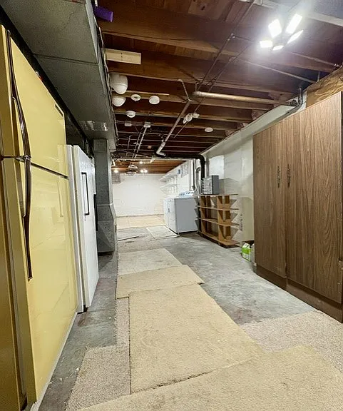 Additional Basement Storage with Refrigerator, Deep Freeze, Washer and Dryer