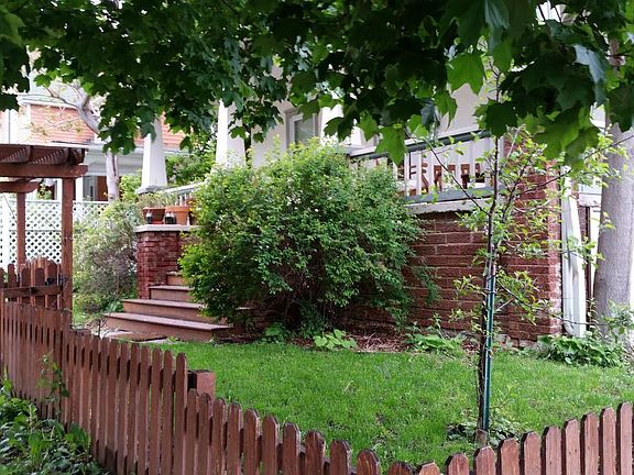Note Charming Fully Fenced Front Yard.
