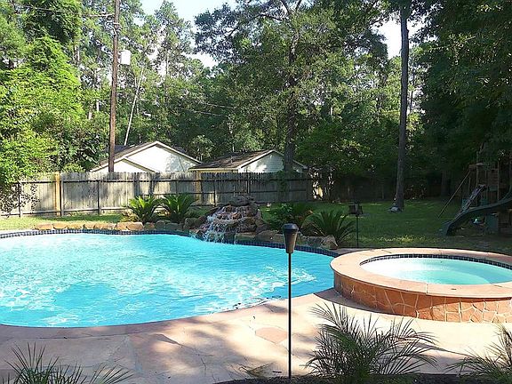 This home sits on a large lot - nearly half an acre! Pool, spa, and still plenty of green space.