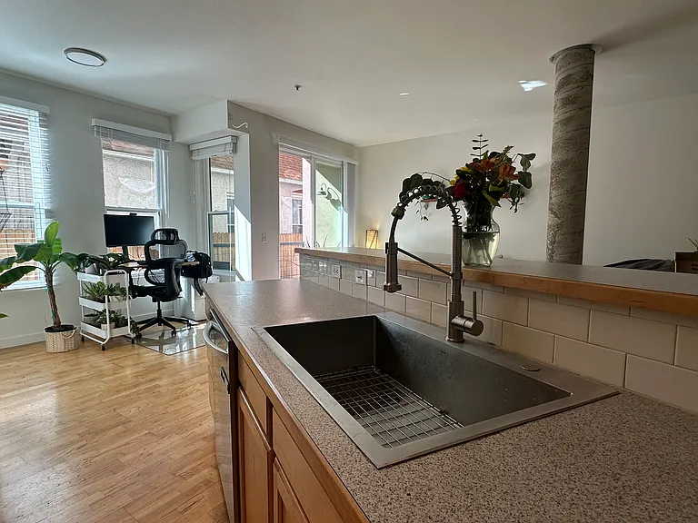 2422 Tremont Pl #103 — Photo 7