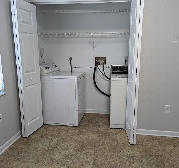 Laundry is in a closet in the Kitchen