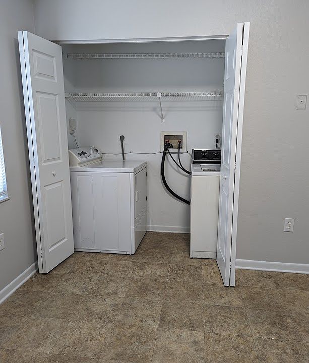 Laundry is in a closet in the Kitchen