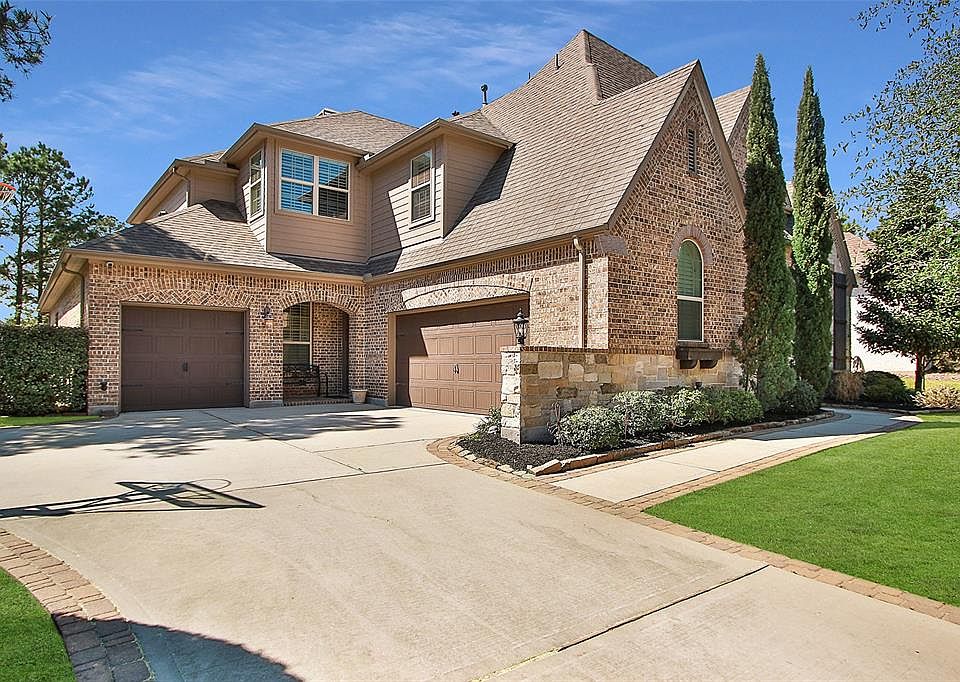 This 2011 Highland Home boasts a huge driveway! Have teen drivers? Plenty of parking for everybody plus a basketball court for play!