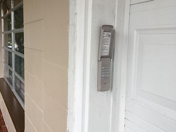 Forgot your house key? Never get locked out! Garage door opener has keypad.