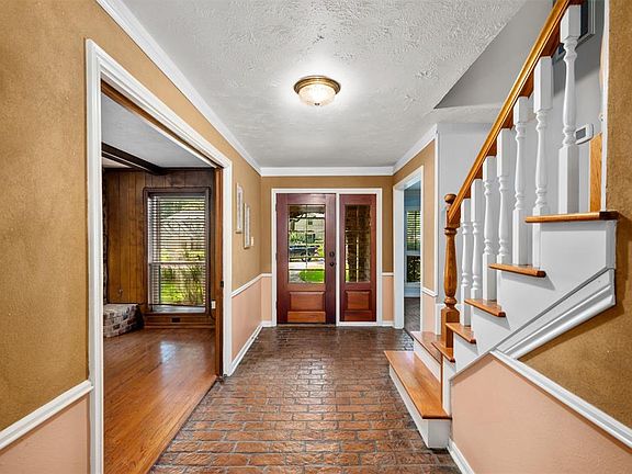 Original brick tile foyer flooring