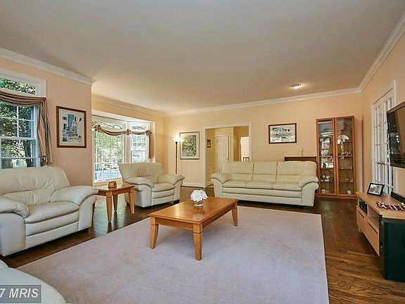 Living room also features hardwood flooring