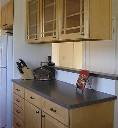 The kitchen cabinets and countertops are alll new