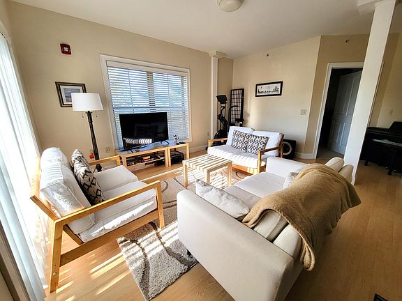 Living room with slider to balcony