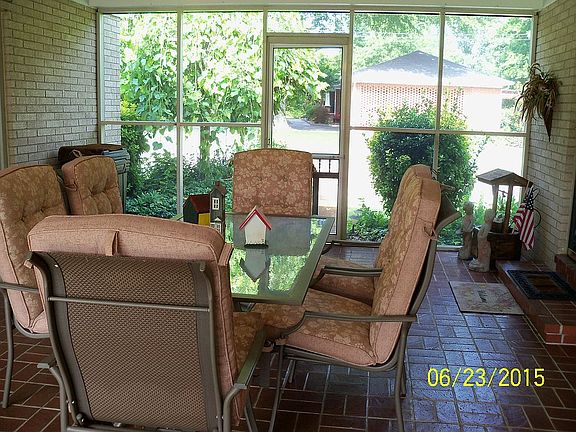 Screend Patio w/ Brick floor