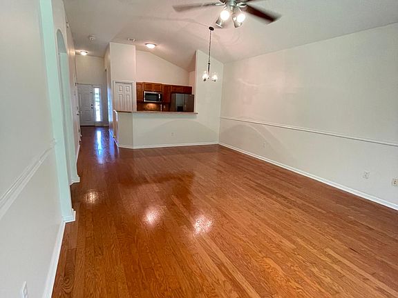 Large living with wood floors