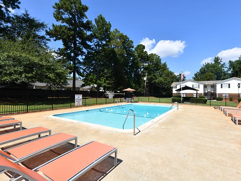 Pool area with lounge chairs