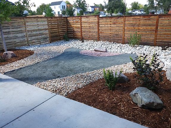 Newly xeriscaped private back yard with patio