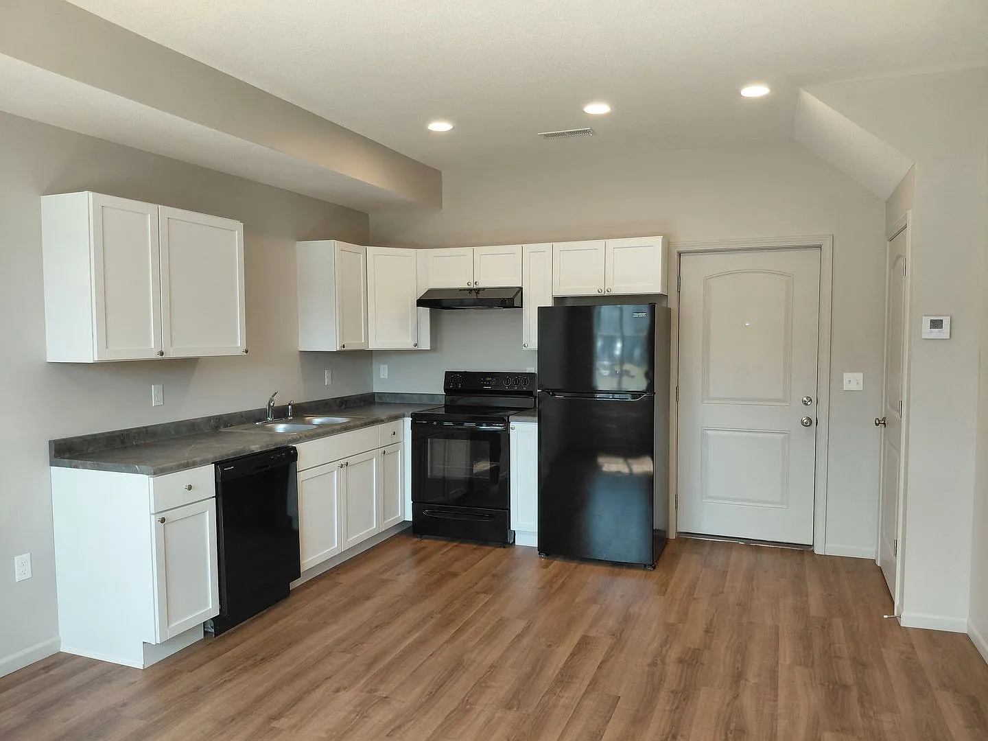 Townhome Apartments — Photo 1