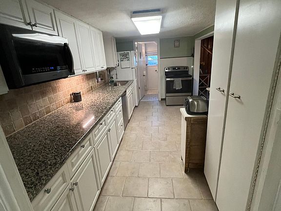 Kitchen with granite countertops