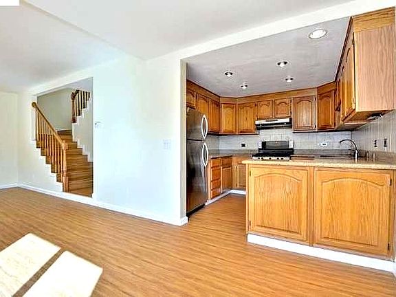 Updated Kitchen with Granite countertops and Stainless Steel Appliances. Gas Stove, Dishwasher, Deep sink