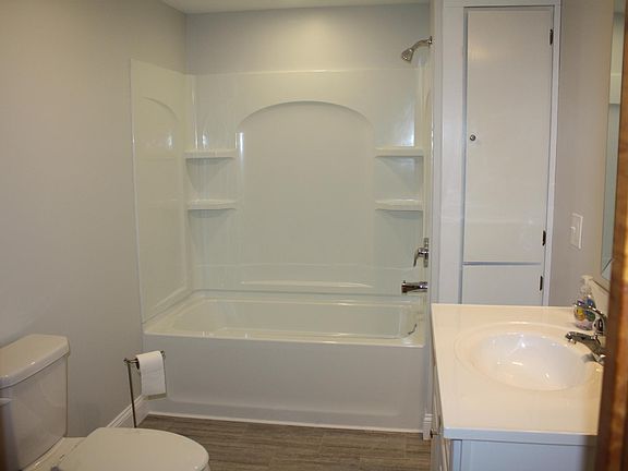 New tub, vanity and toilet.