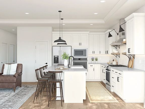 Kitchen with quartz island and countertops