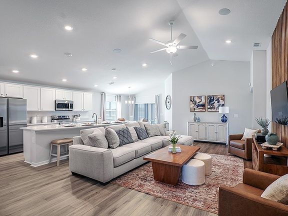 This popular 1,819 sq. ft. home plan includes a sunny open-concept layout - Raychel by Highland Home