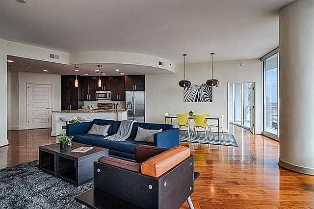 Bright open floor plan with beautiful hardwood floors.