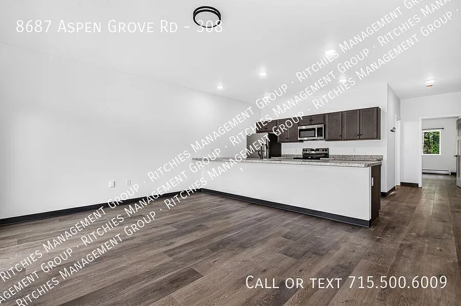 Brand-New Large Open-Concept 1 Bedroom Apartment with Garage & In-Unit Laundry — Photo 2