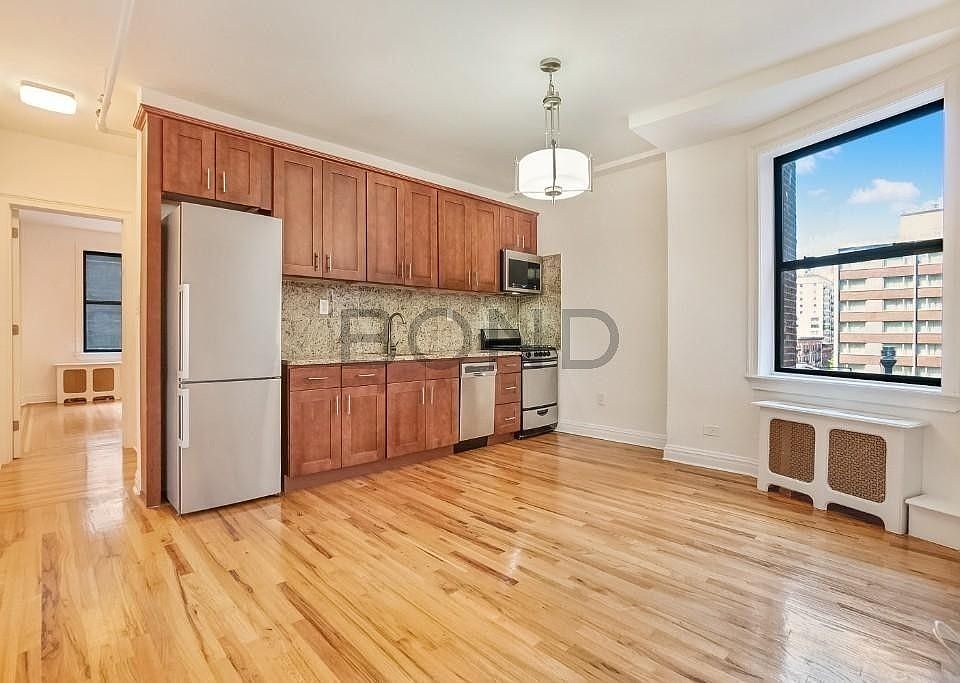 1st image of 245 W 51st St APT 303A