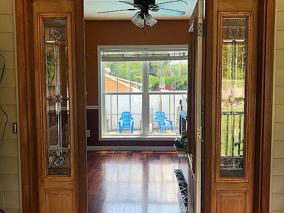 Front door with pool view