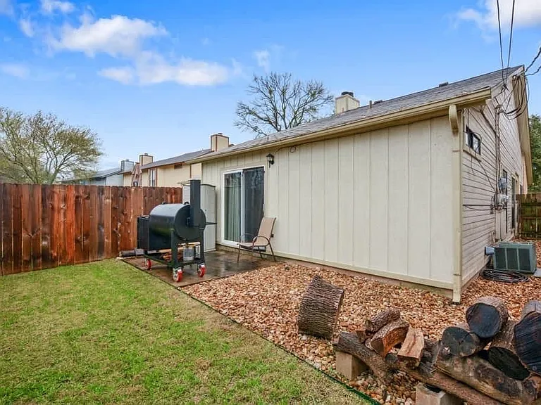 Grill not included. House is painted grey now.