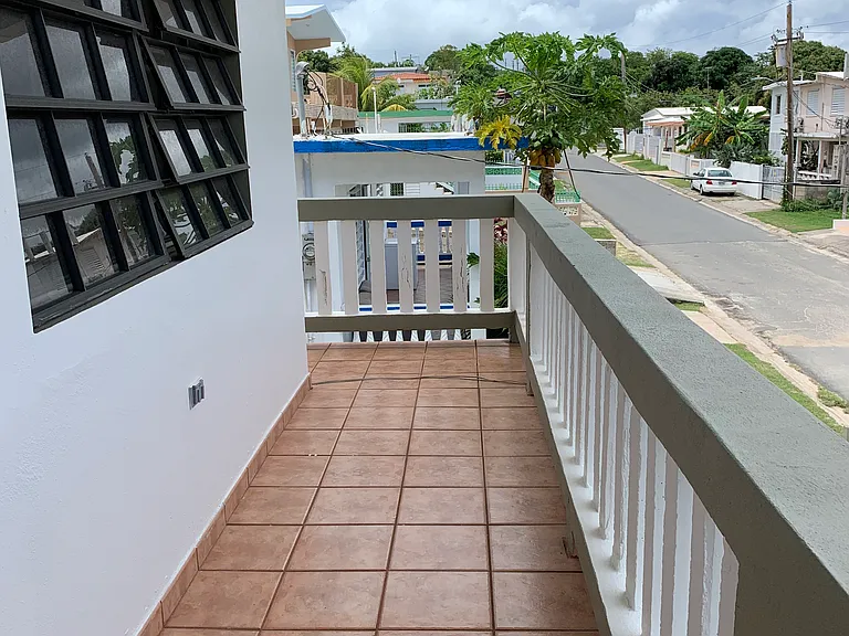 Street side balcony. Access through bedroom.