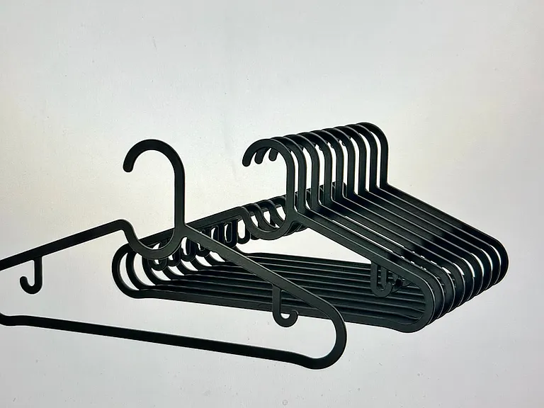 Hangers, plates, cups, cookware, & silverware included