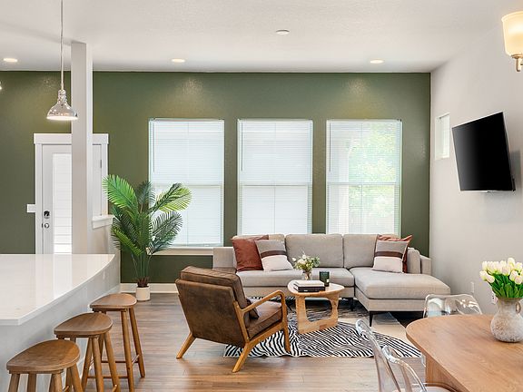 Cozy modern house with bright living room, fully equipped kitchen, and stylish decor. Perfect for travelers seeking comfort and tranquility. Book your ideal stay now #ModernApartment #VacationRental