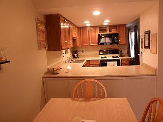 View of Kitchen via Dining Room