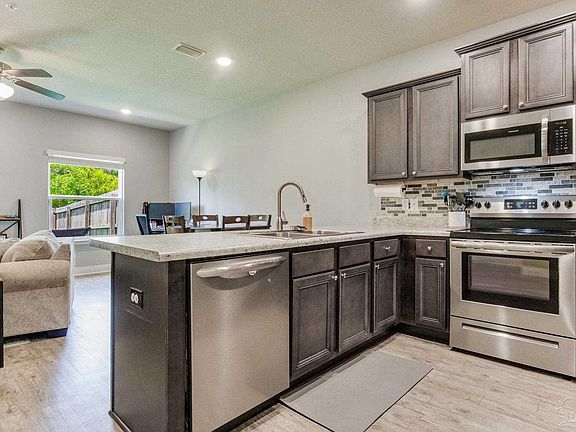 4th image of 6021 Royal Port Ct