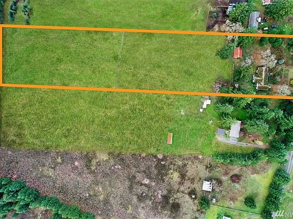 5.5 acres that span from the road to the tree line way over yonder