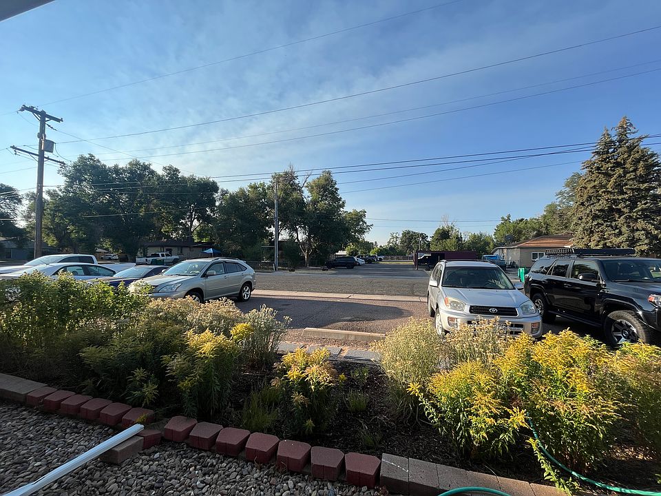 View from living room showing parking spaces