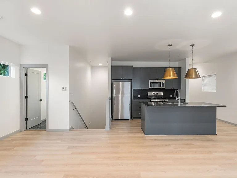 Quaker Condos - $300 Off Immediate Move-Ins! — Photo 3