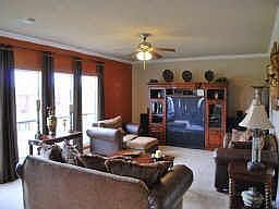 EXPANSIVE FAMILY AREA OFFERS CROWN MOLDING AND IS PERFECT FOR RELAXING WITH FRIENDS AND FAMILY!