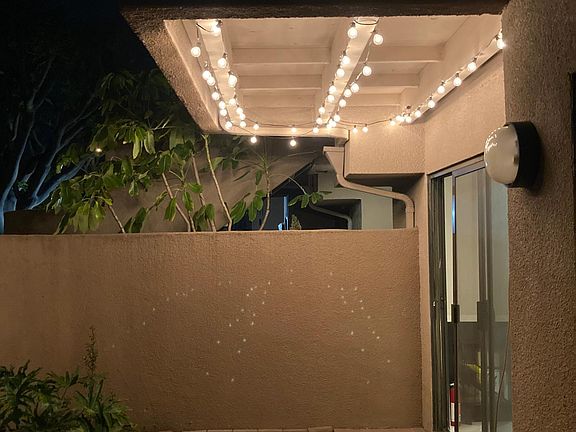 market lights on patio brighten it up beautifully at night.