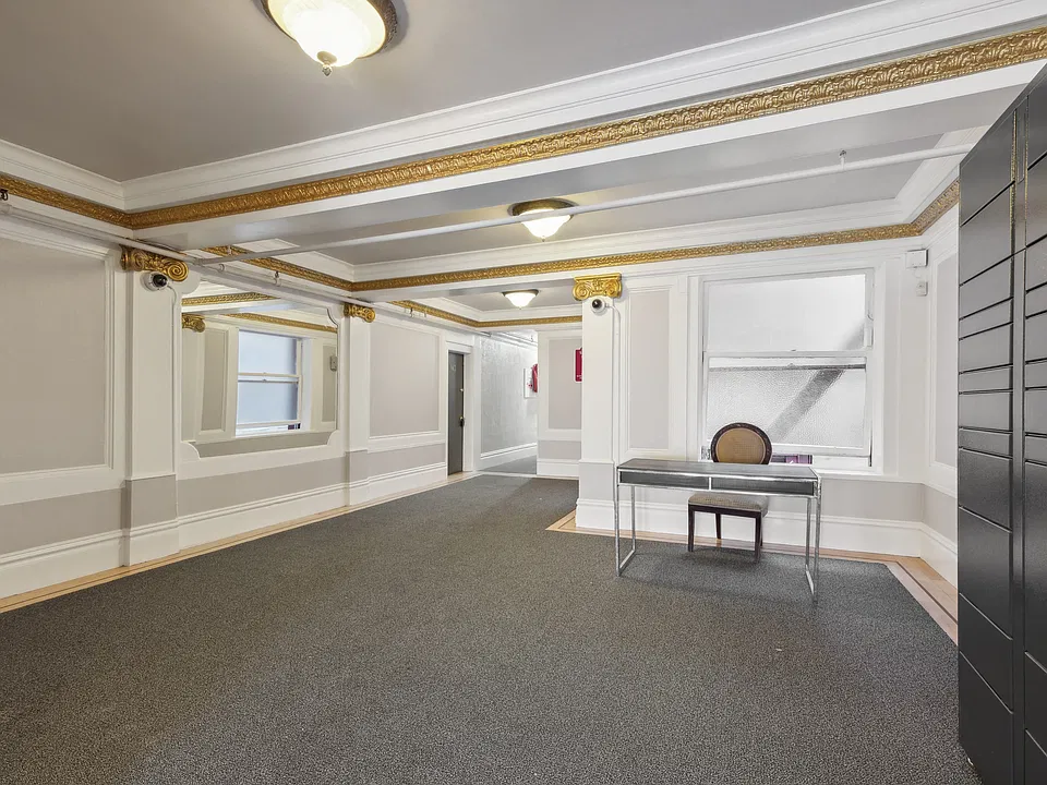 Lobby with a front desk and an Amazon Hub Locker