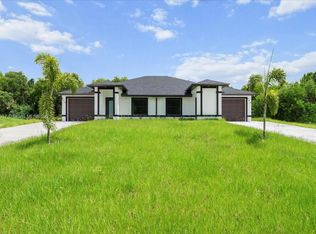 668/670 Chemstrand St E, Lehigh Acres, FL 33974