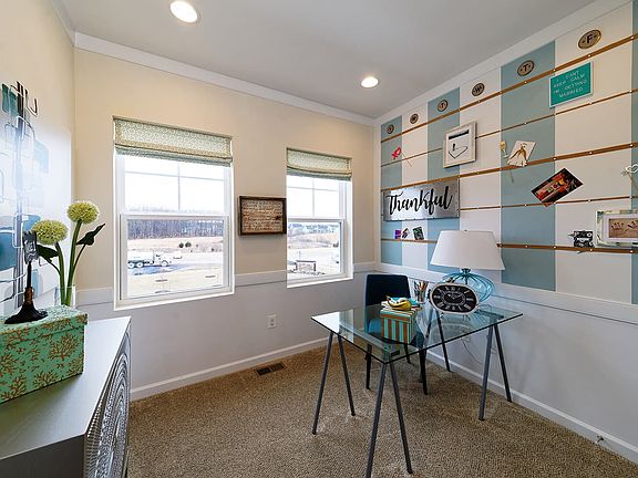 A secondary bedroom in the Sage townhome at Nexton by Brookfield Residential.