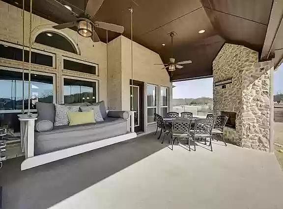 Large private back patio with gas & wood burning fireplace