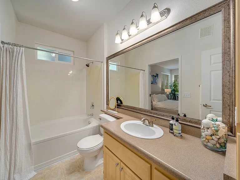 Spacious bathrooms with roman soaking tubs