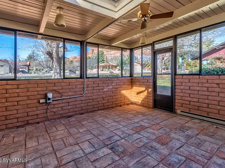 Enclosed patio with red rock views. Electrical outlet for hot tub.
