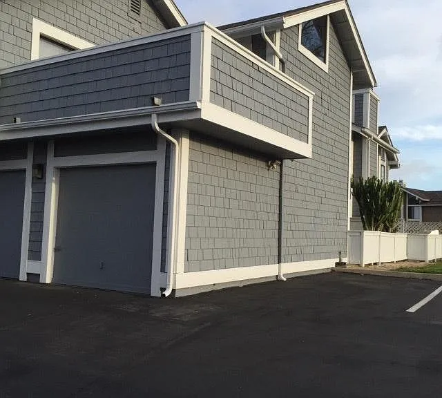 1 car garage with spaces next to it